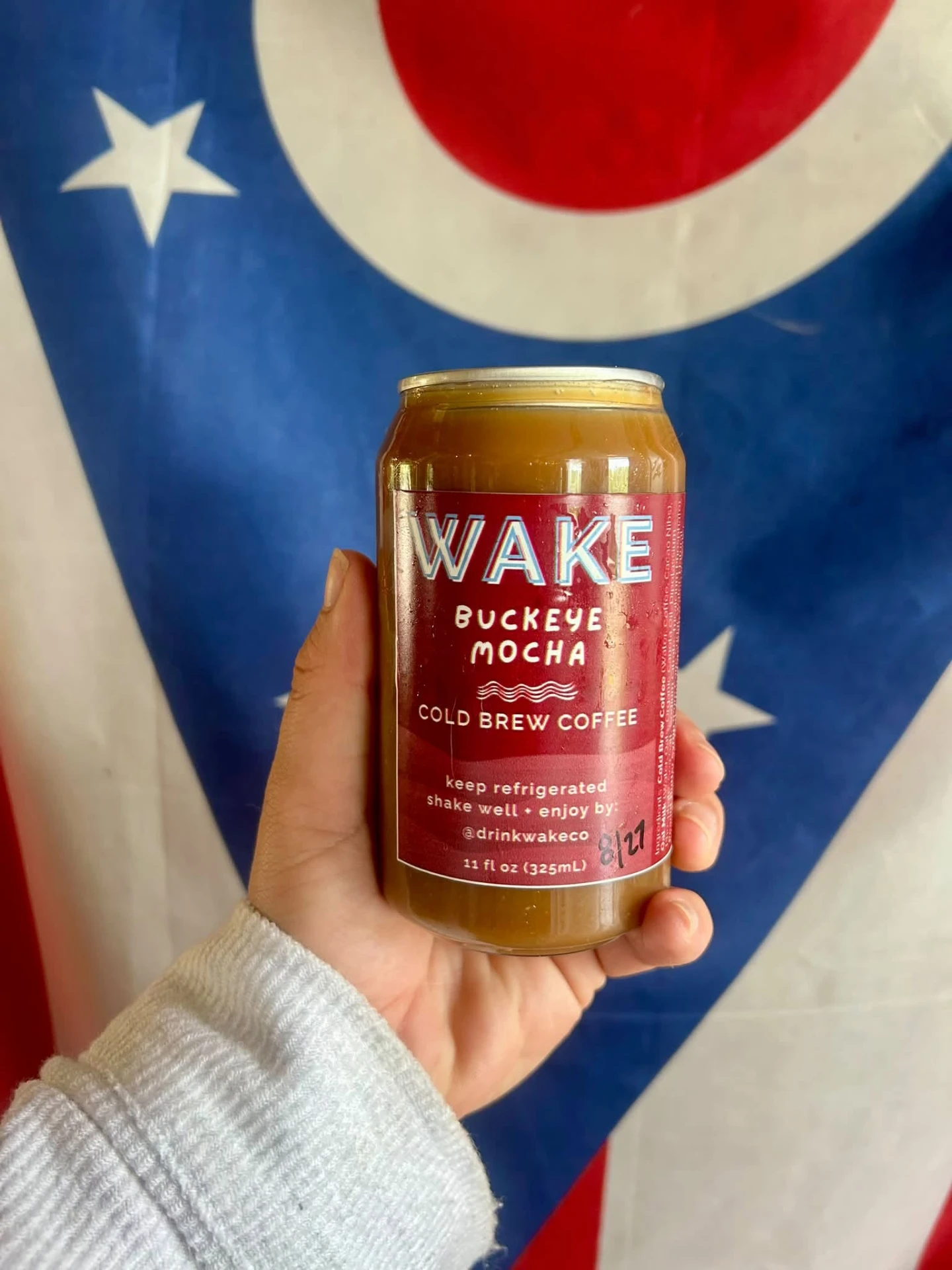 Buckeye Mocha can in front of an Ohio flag