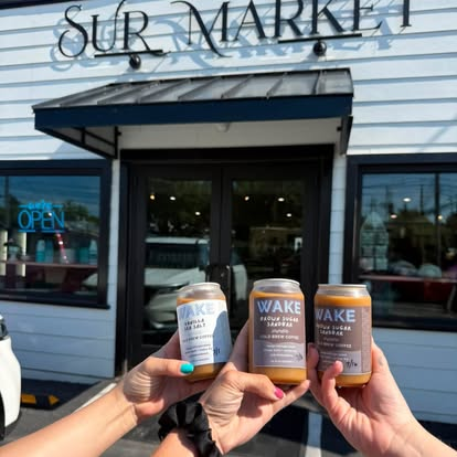 Three WAKE cans held up outside Sur Market